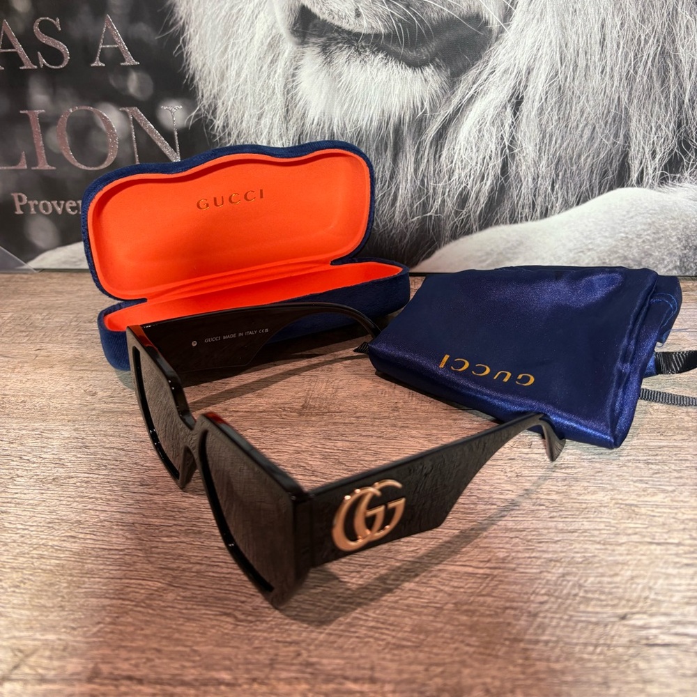 Gucci Black and Gold Sunglasses